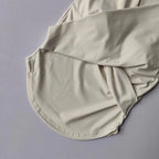 Neutral female quick dry sports top with built in cup for yoga and workout comfort