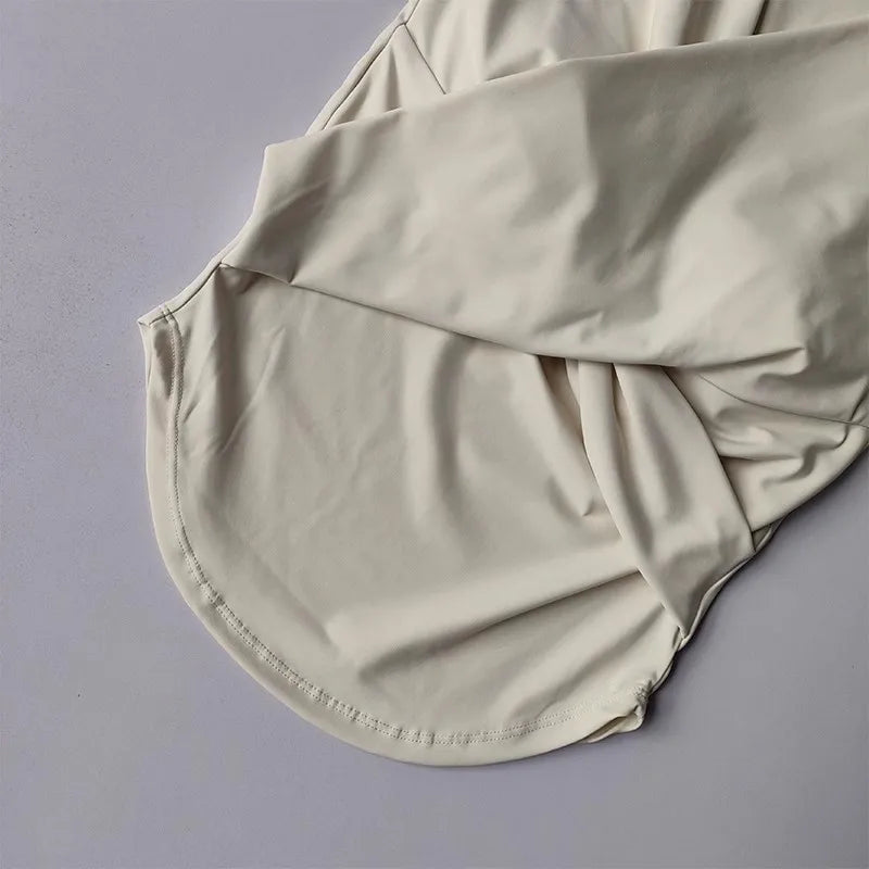 Neutral female quick dry sports top with built in cup for yoga and workout comfort