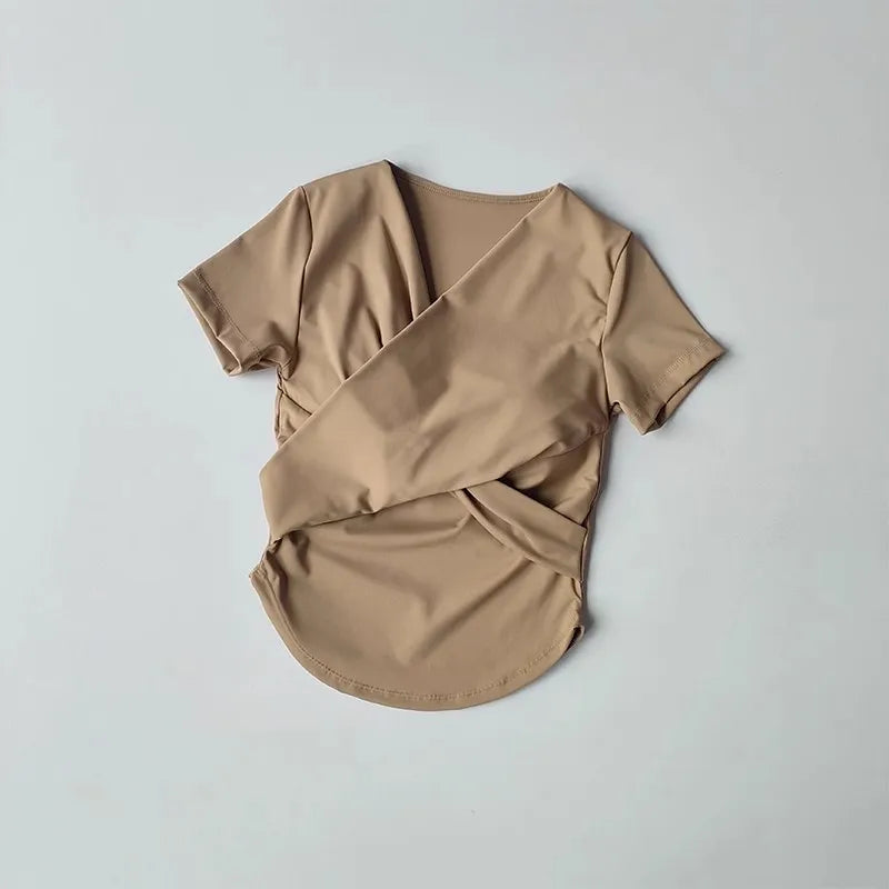 The Lady's Haven Boutique female quick dry sports top with built in cup in a neutral hue for active wear