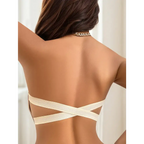 Back view of a woman wearing a beige festival strapless brassiere with crisscross straps