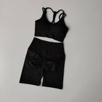 Black fitness bra and shorts set with a stylish design for active workouts