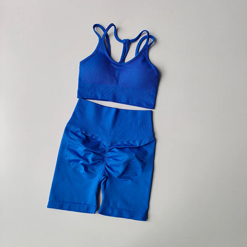 Blue fitness bra and shorts set featuring a stylish design from The Lady's Haven Boutique
