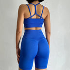 Back view of a blue fitness bra and shorts set from The Lady's Haven Boutique showcasing a stylish design