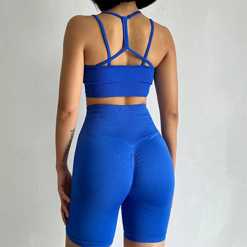 Back view of a blue fitness bra and shorts set from The Lady's Haven Boutique showcasing a stylish design