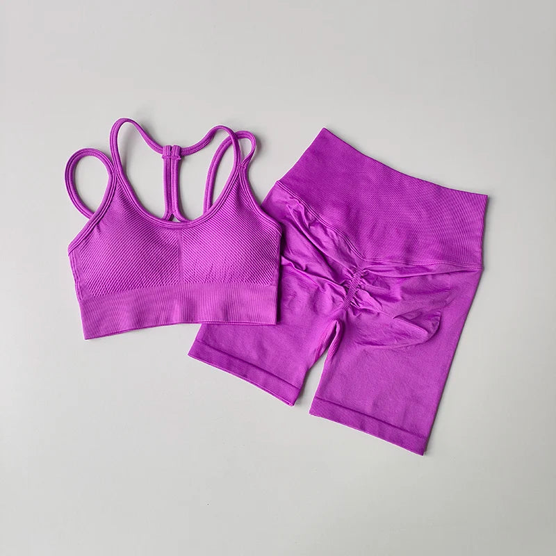 Purple fitness bra and shorts set featuring a stylish design for comfortable workouts