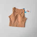Beige front zipper fitness bra for comfortable support during workouts