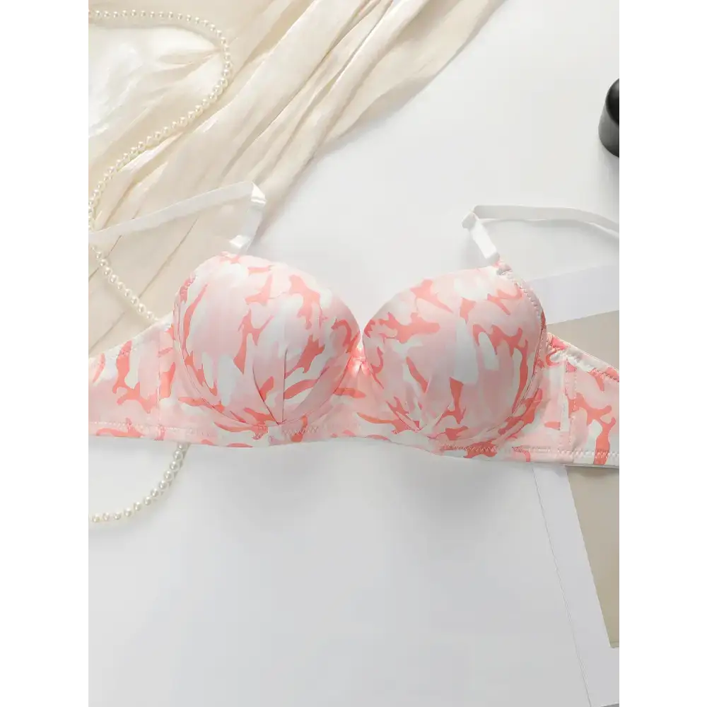 Pink and white gathering bra and panty set with steel ring featuring floral patterns from The Lady's Haven Boutique