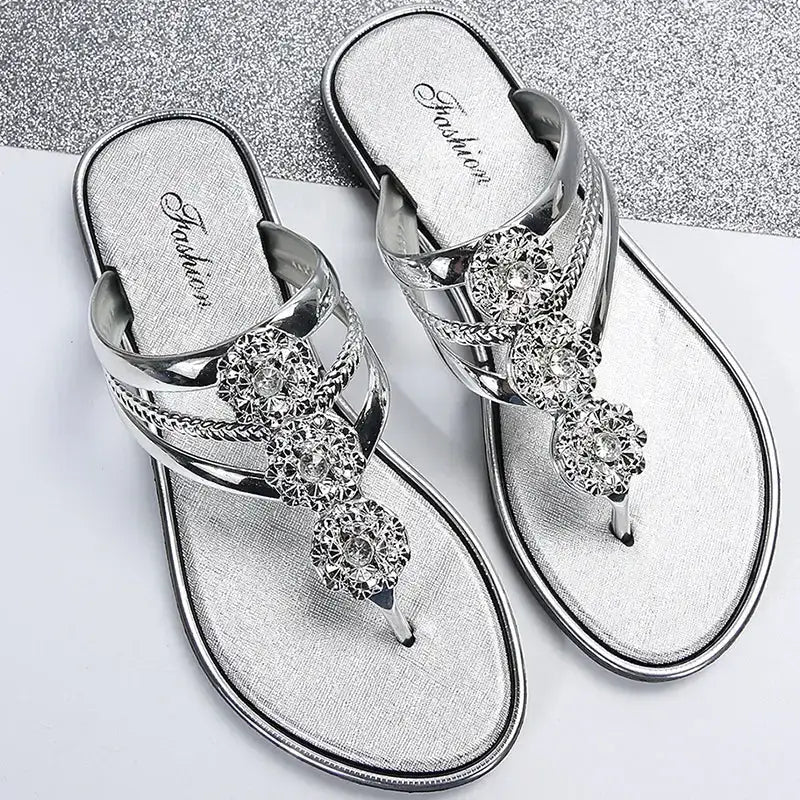 Silver flat heel glitter floral summer sandals with decorative rhinestone flowers from The Lady's Haven Boutique