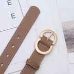 Tan leather belt with a stylish gold buckle waist belt, perfect for adding flair to any outfit