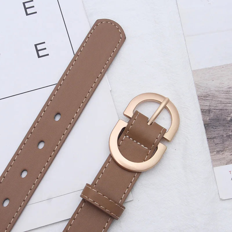 Tan leather belt with a stylish gold buckle waist belt, perfect for adding flair to any outfit
