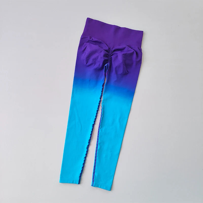 Gradient running leggings in vibrant purple and blue colors designed for ultimate comfort and style