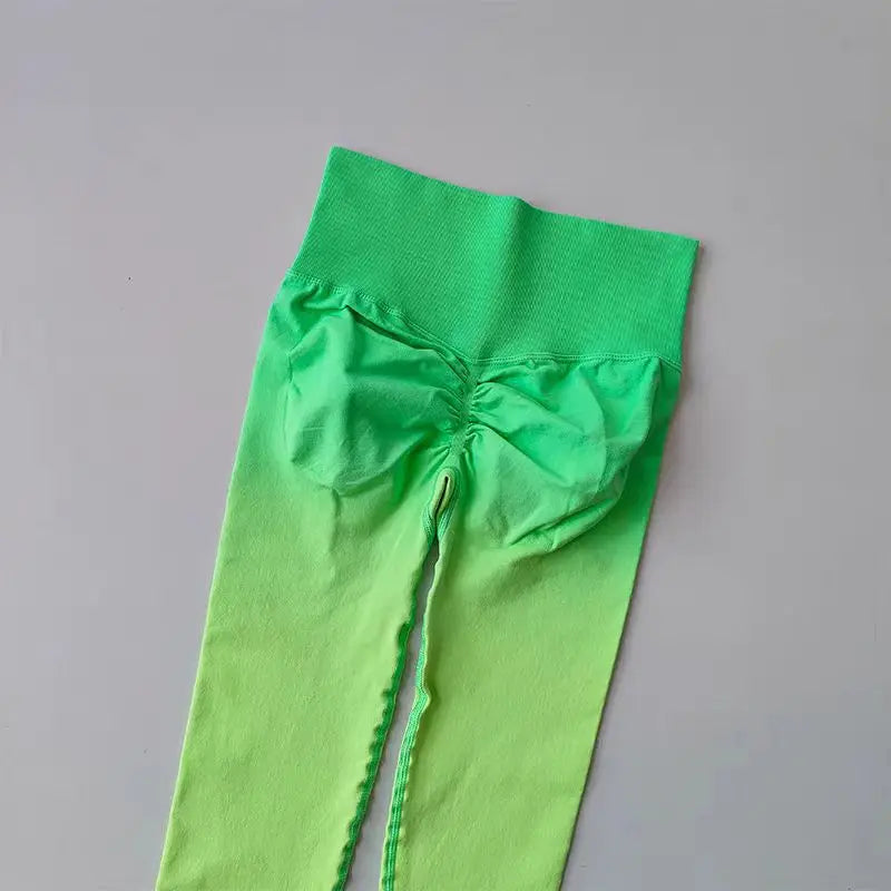 Gradient running leggings from The Lady's Haven Boutique in vibrant green for stylish workouts