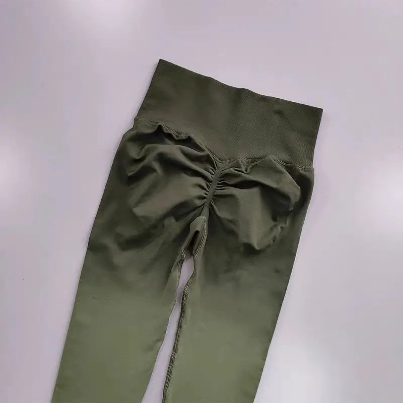 Gradient running leggings in olive green with stylish ruched back design for comfortable workouts