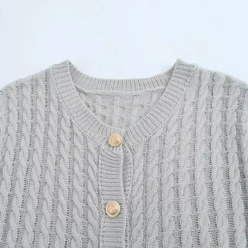 Gray cable knit cropped sweater cardigan with wooden buttons and round neckline from The Lady's Haven Boutique