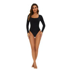 The Lady's Haven Boutique black long sleeve big u neck shapewear bodysuit on female model