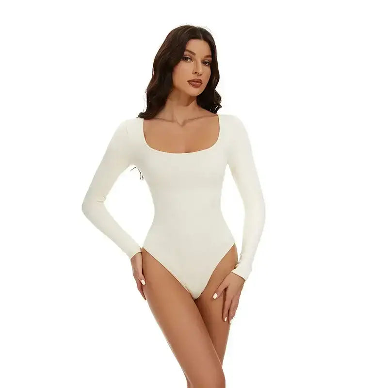 Woman wearing white big u neck shapewear bodysuit with long sleeves and smooth fit
