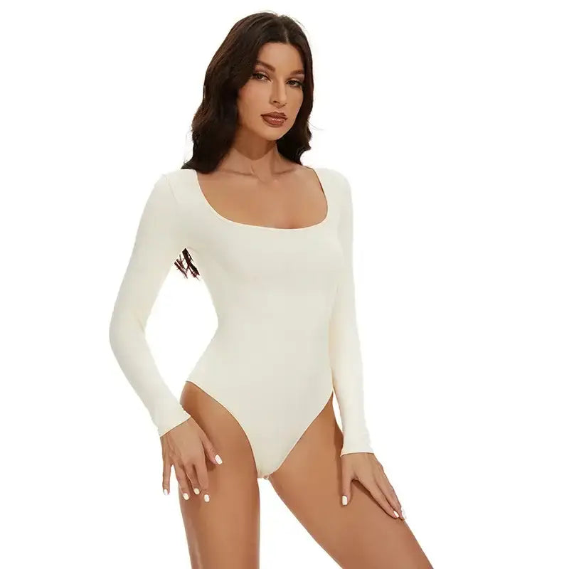 The Lady's Haven Boutique big u neck shapewear bodysuit in white with long sleeves and fitted design