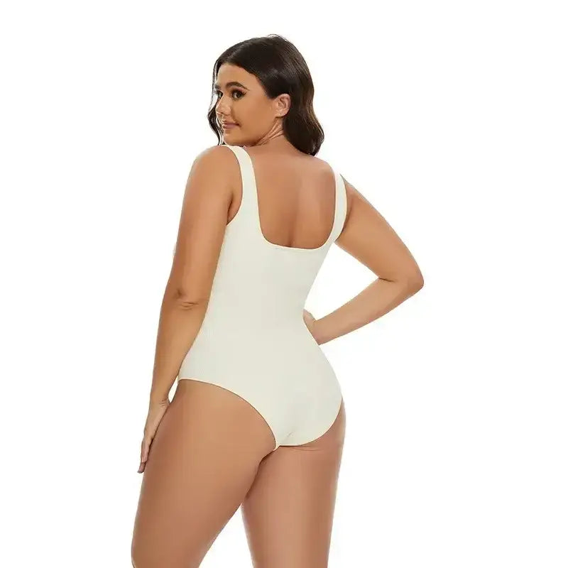 Woman wearing white daily spandex body shapewear essentials from The Lady's Haven Boutique