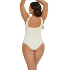 Woman wearing white daily spandex body shapewear essentials bodysuit from The Lady's Haven Boutique