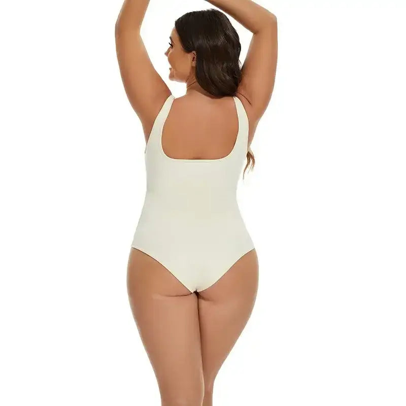 Woman wearing white daily spandex body shapewear essentials bodysuit from The Lady's Haven Boutique