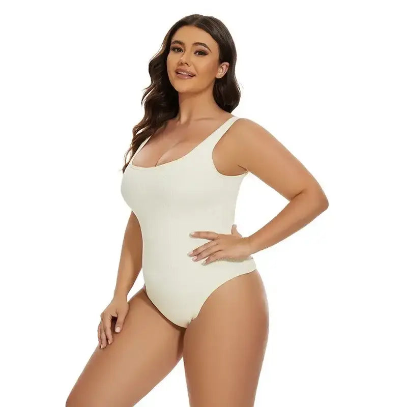 Woman wearing white daily spandex body shapewear essentials bodysuit with scoop neckline
