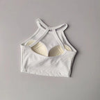 White gym top fitness camisole with stylish back design for comfortable workouts