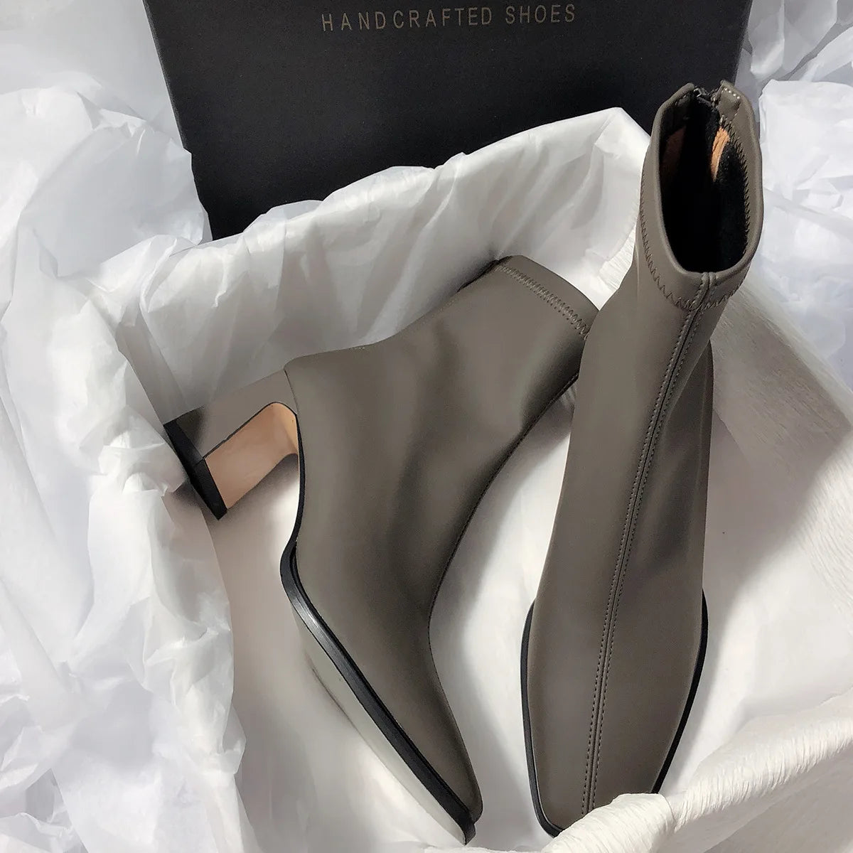 Gray fashion boots with back zipper and block heels from The Lady's Haven Boutique