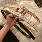 Heart buckle waist belt collection in pink, white, and black with perforated hearts design