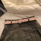 Heart buckle waist belt in pink with heart cutouts, perfect for stylish outfits