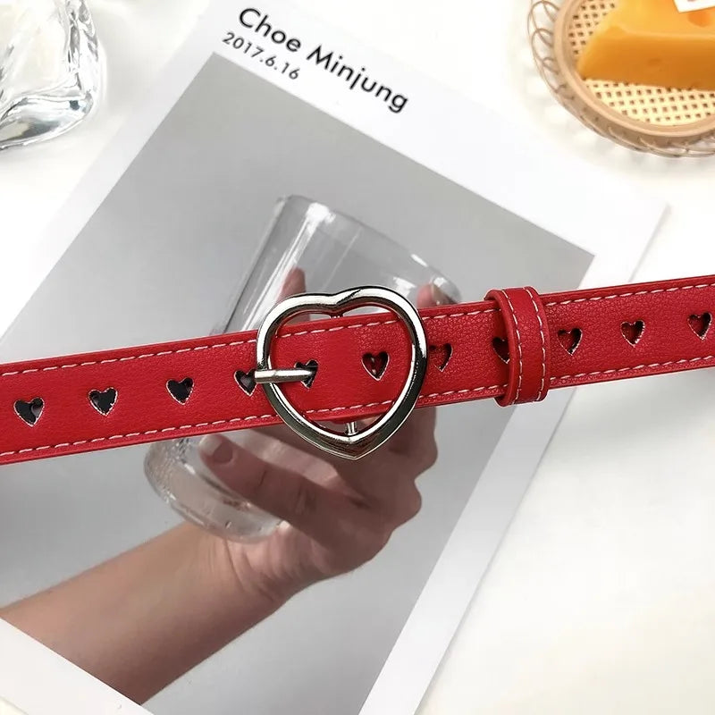 Red heart buckle waist belt with cut-out heart design for stylish fashion accessories