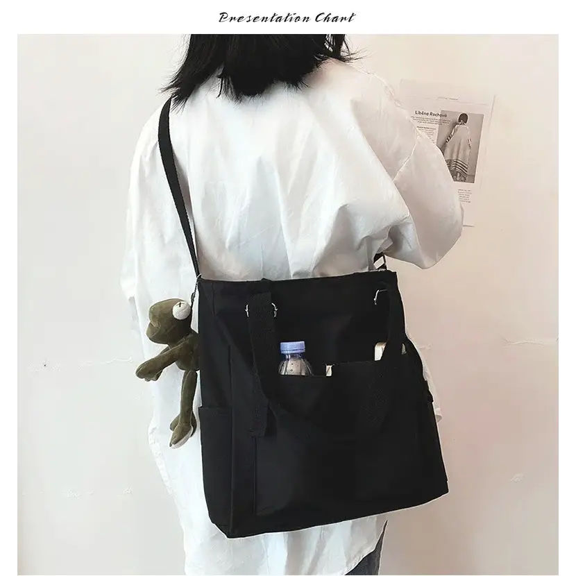 Stylish high capacity waterproof nylon handbags in black with adjustable strap and side pockets