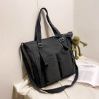 Stylish high capacity waterproof nylon handbags with multiple pockets and detachable straps