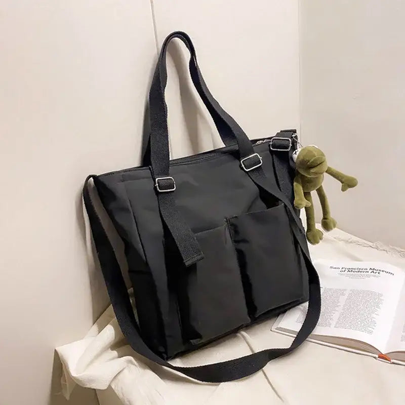 Stylish high capacity waterproof nylon handbags with multiple pockets and detachable straps