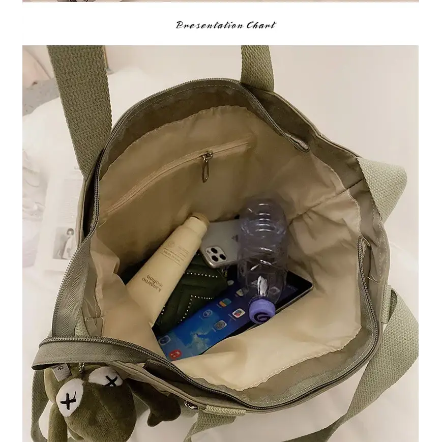 Inside view of high capacity waterproof nylon handbags showing organized space for essentials and a stylish design