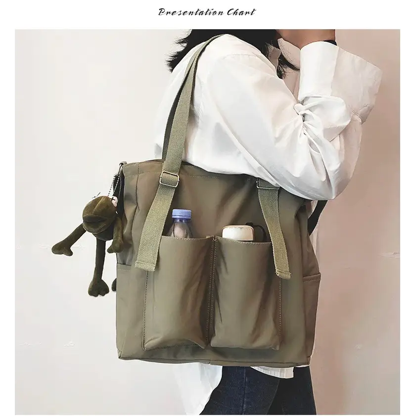Fashionable high capacity waterproof nylon handbags featuring multiple pockets and adjustable straps