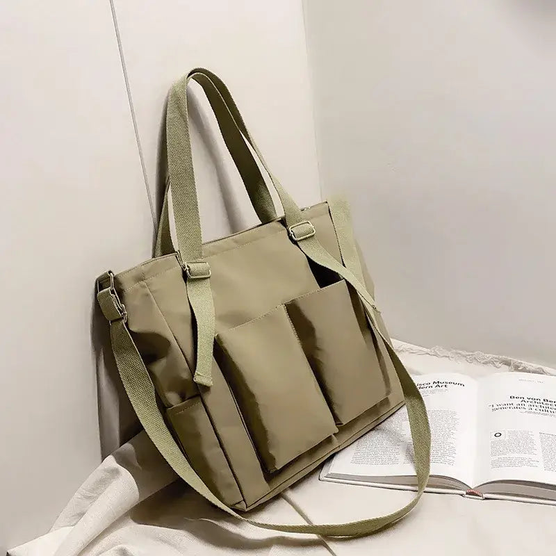 High capacity waterproof nylon handbags with multiple pockets for versatile use and daily essentials