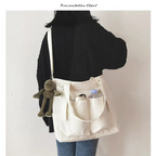 High capacity waterproof nylon handbags in cream color, ideal for daily use and versatile storage