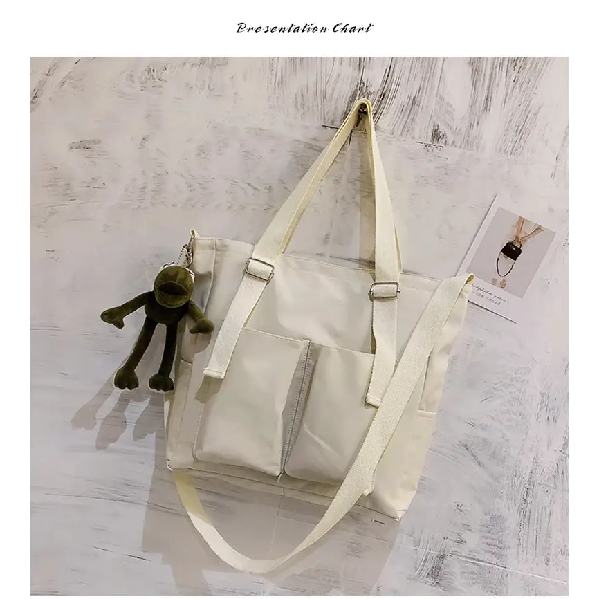 Stylish high capacity waterproof nylon handbags in white with adjustable straps and exterior pockets