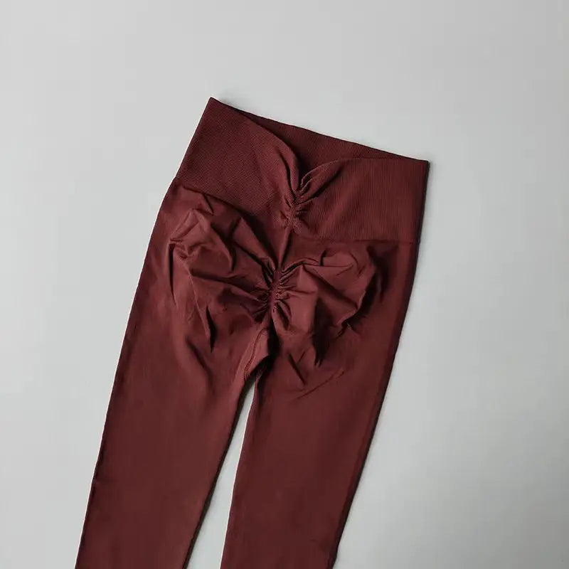 Maroon high elastic running leggings women with unique ruched design for comfortable workouts
