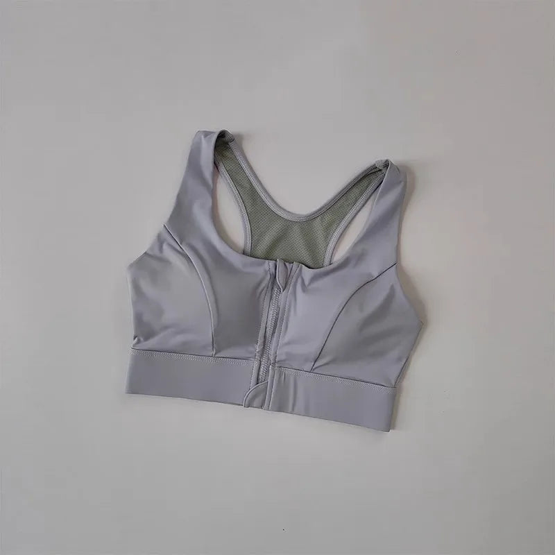Light purple high impact sports bra for women with a zip front and breathable mesh detailing