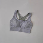 Light purple high impact sports bra for women with a zip front and breathable mesh detailing