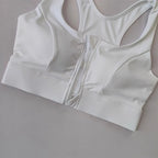 White high impact sports bra for women with zip closure and mesh panels for breathability