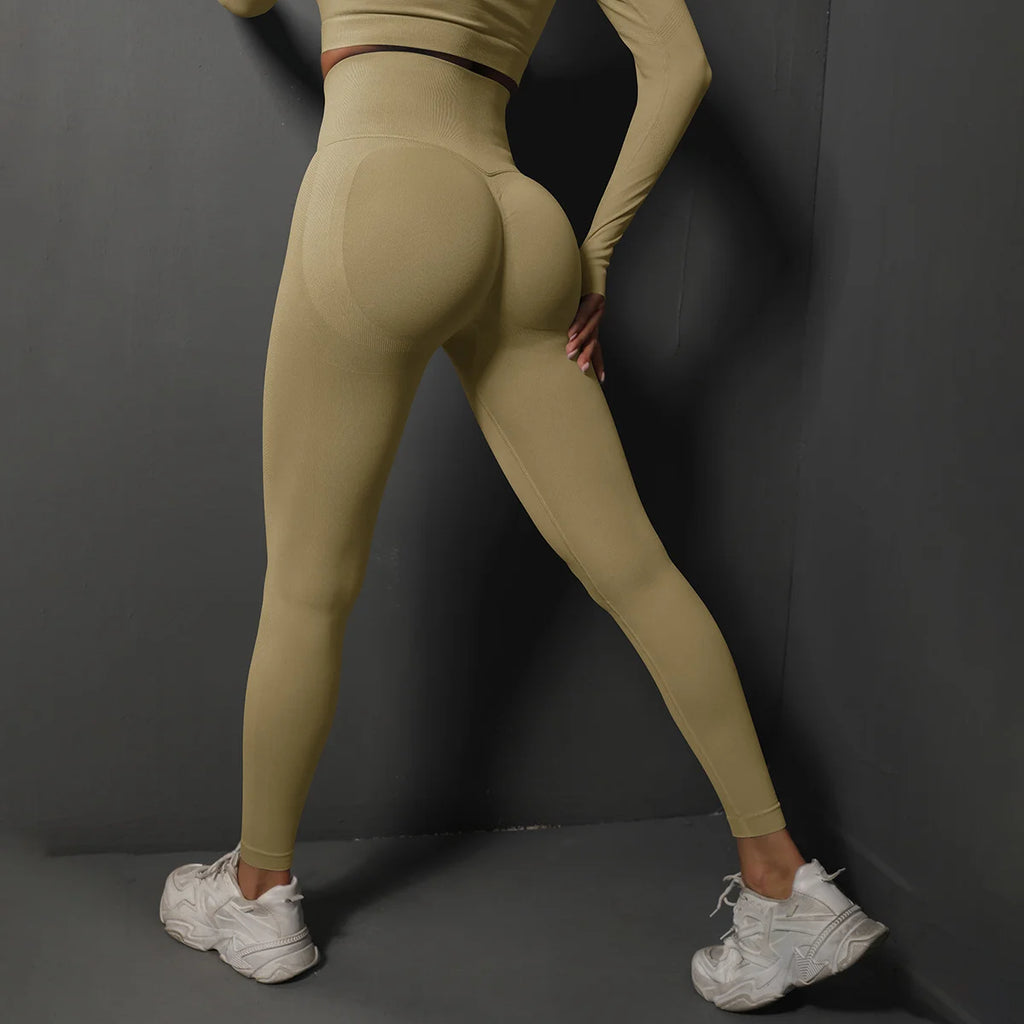 High waist seamless yoga leggings in light beige, designed for comfort and flexibility during workouts
