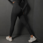 High waist seamless yoga leggings in black, perfect for comfort and flexibility during workouts