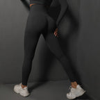 High waist seamless yoga leggings in black with form-fitting design for comfortable workouts