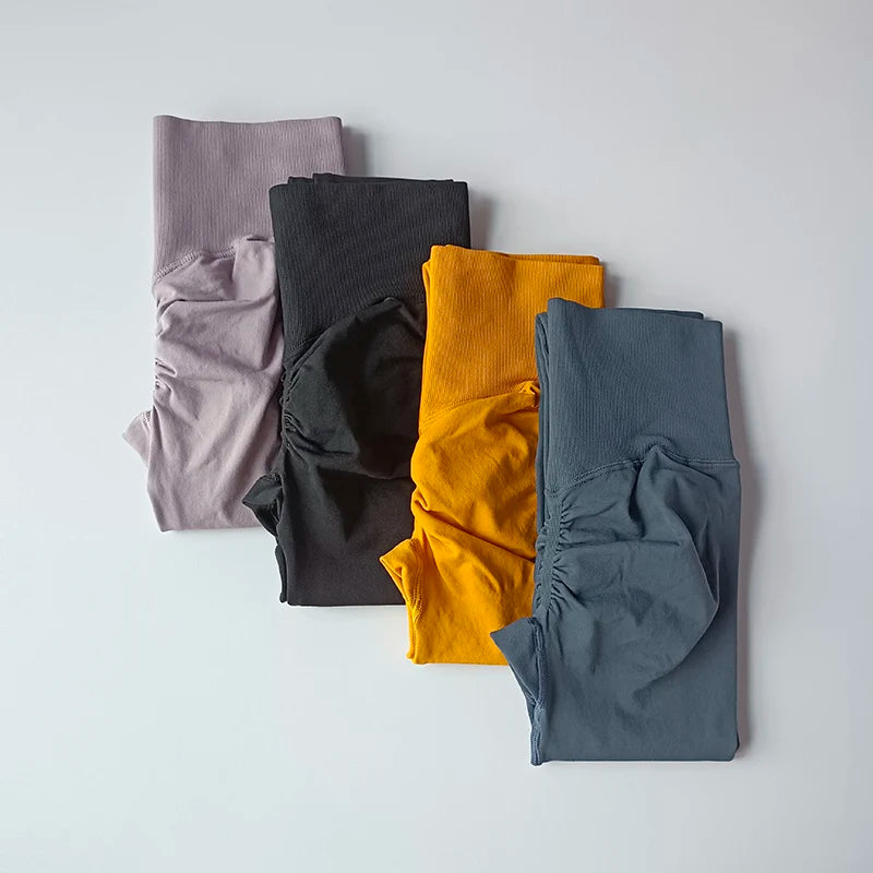 High waist seamless yoga leggings in four colors from The Lady's Haven Boutique, folded neatly