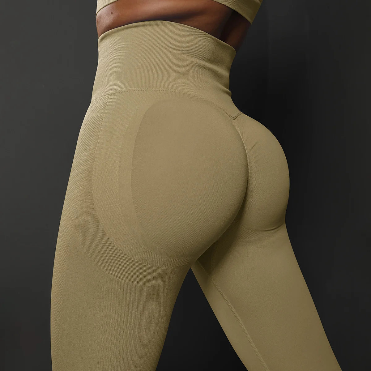 High waist seamless yoga leggings in a stylish olive green color for ultimate comfort and flexibility