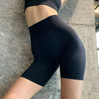 High waist seamless yoga shorts in black, perfect for comfortable workouts and activewear style