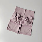 High waist seamless yoga shorts in soft lavender color with a stylish design and comfortable fit