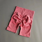 Pink high waist seamless yoga shorts for comfortable workouts and stylish athleisure wear